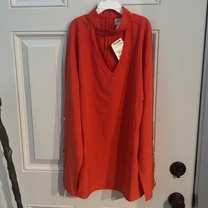 Chico size 2, which is a large shirt.